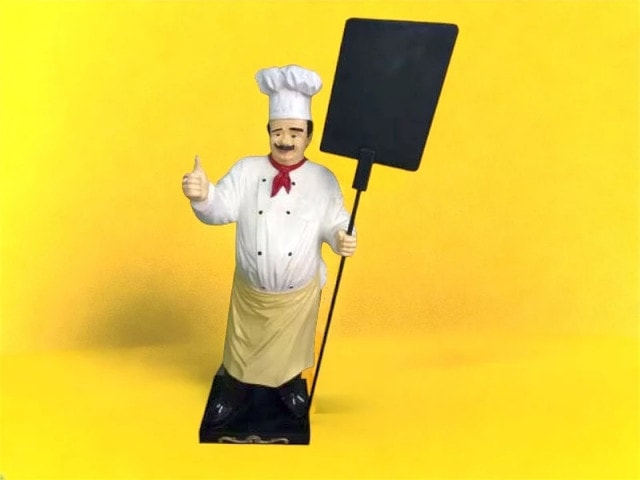 Werbefigur Kuch mit Kreidetafel
